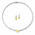 My Store 4 mixed cut white diamond tennis necklace with a central yellow heart diamond and matching drop earrings.
