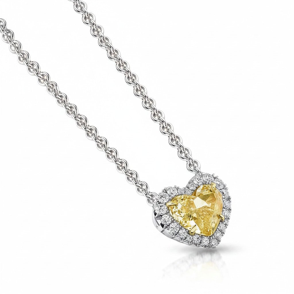 My Store 4 heart-cut fancy yellow diamond pendant necklace with a white diamond halo on a delicate silver chain.