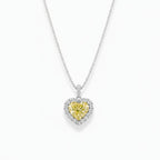 My Store 4 heart-cut fancy yellow diamond pendant necklace with a white diamond halo on a delicate gold cable chain.