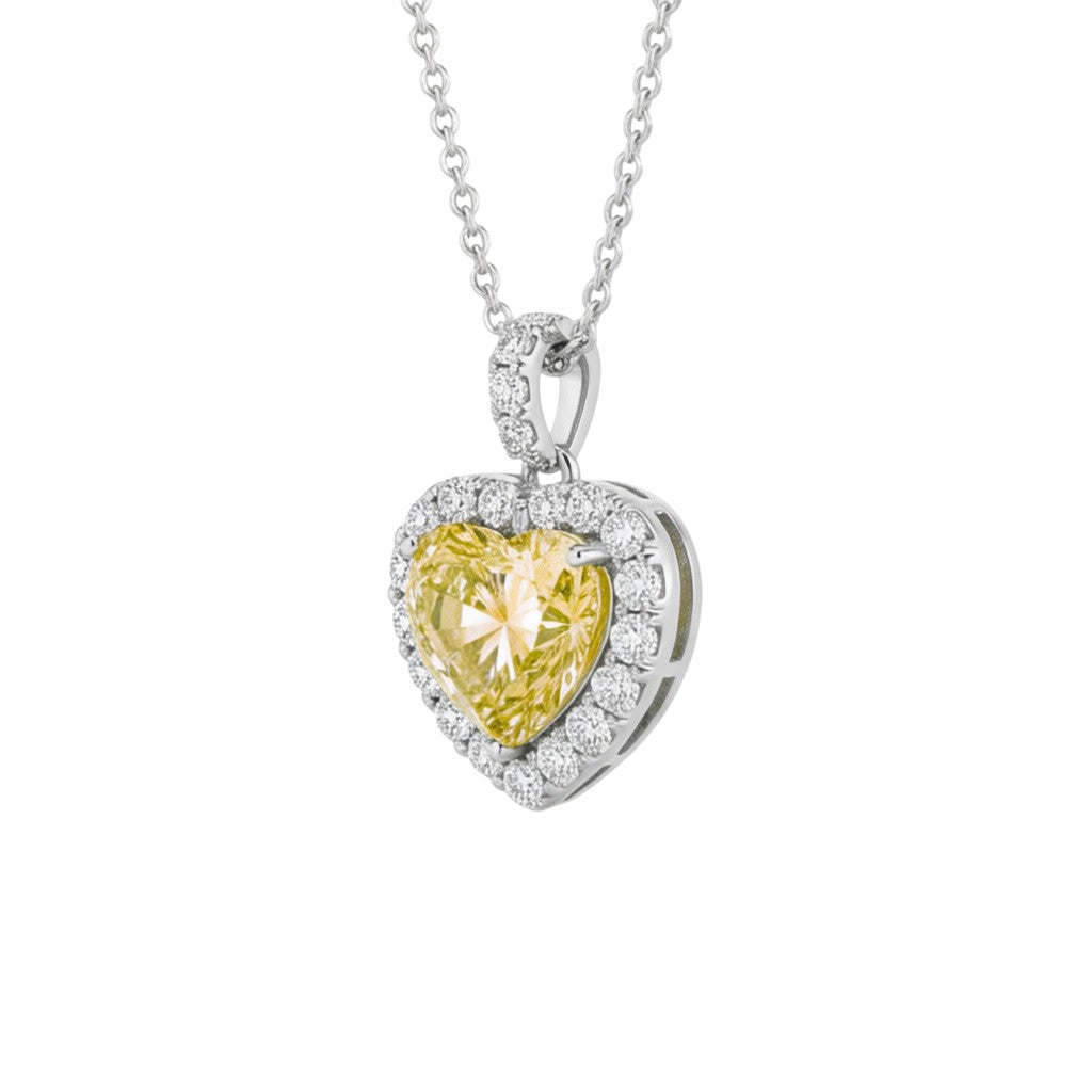 My Store 4 fancy yellow heart-cut diamond pendant necklace with a white diamond halo and diamond-set bail in gold.