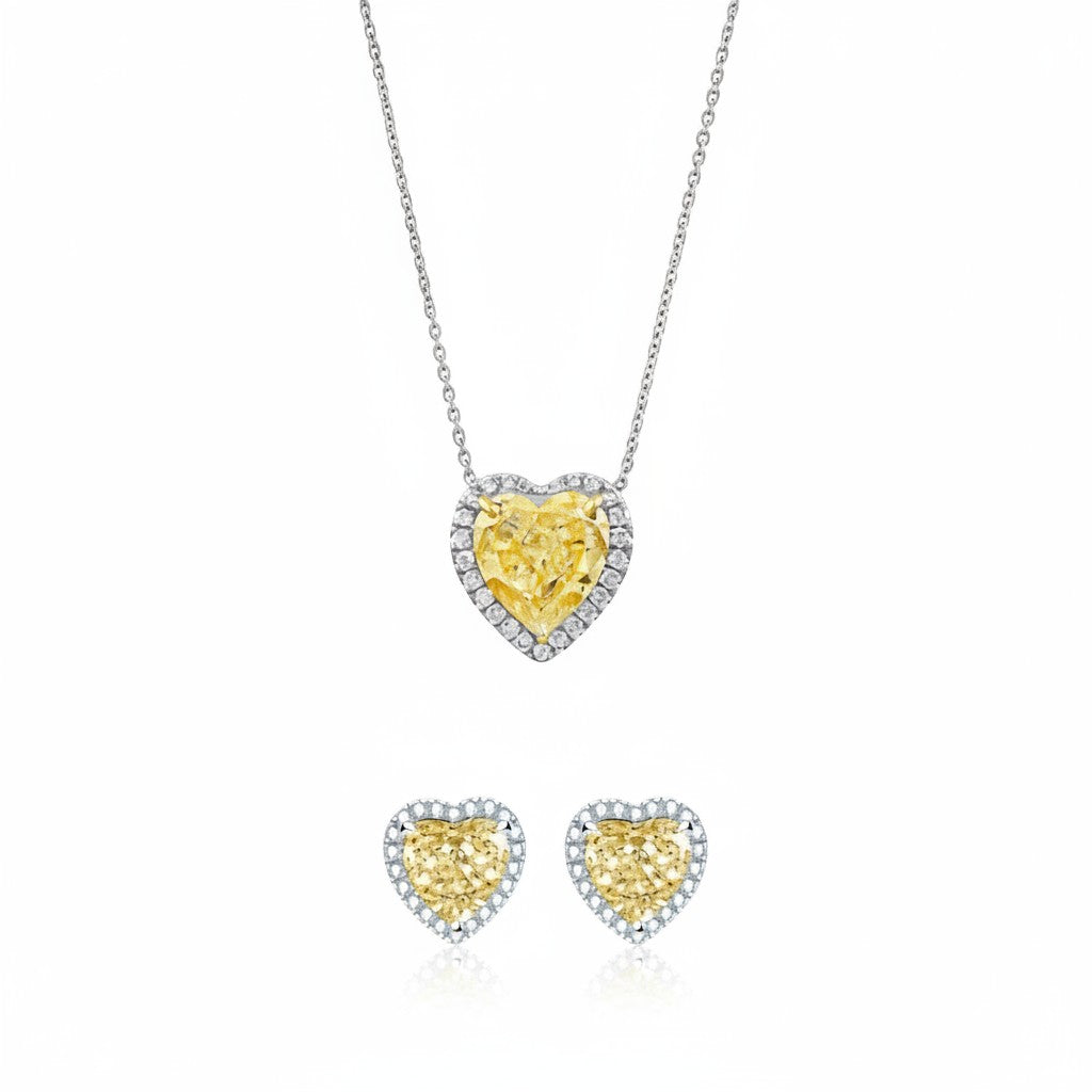 My Store 4 yellow heart-cut diamond halo necklace and matching stud earrings set in white gold with white diamond accents.