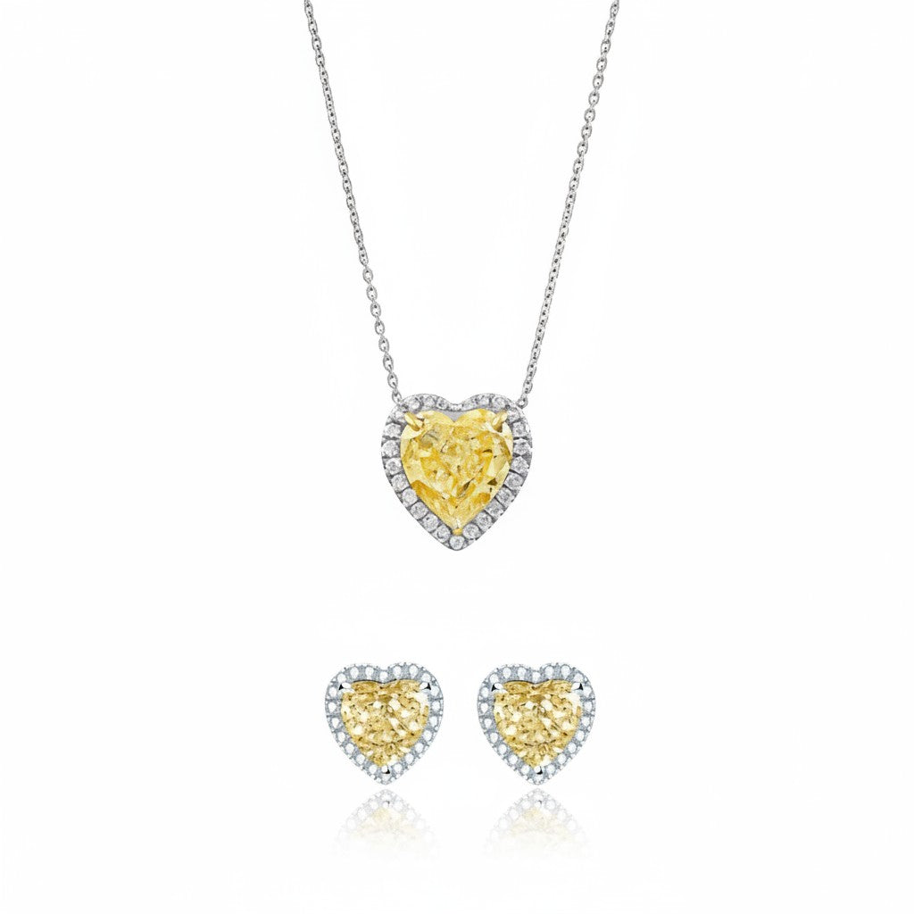 My Store 4 heart-cut yellow diamond halo necklace and matching stud earrings set in white gold.