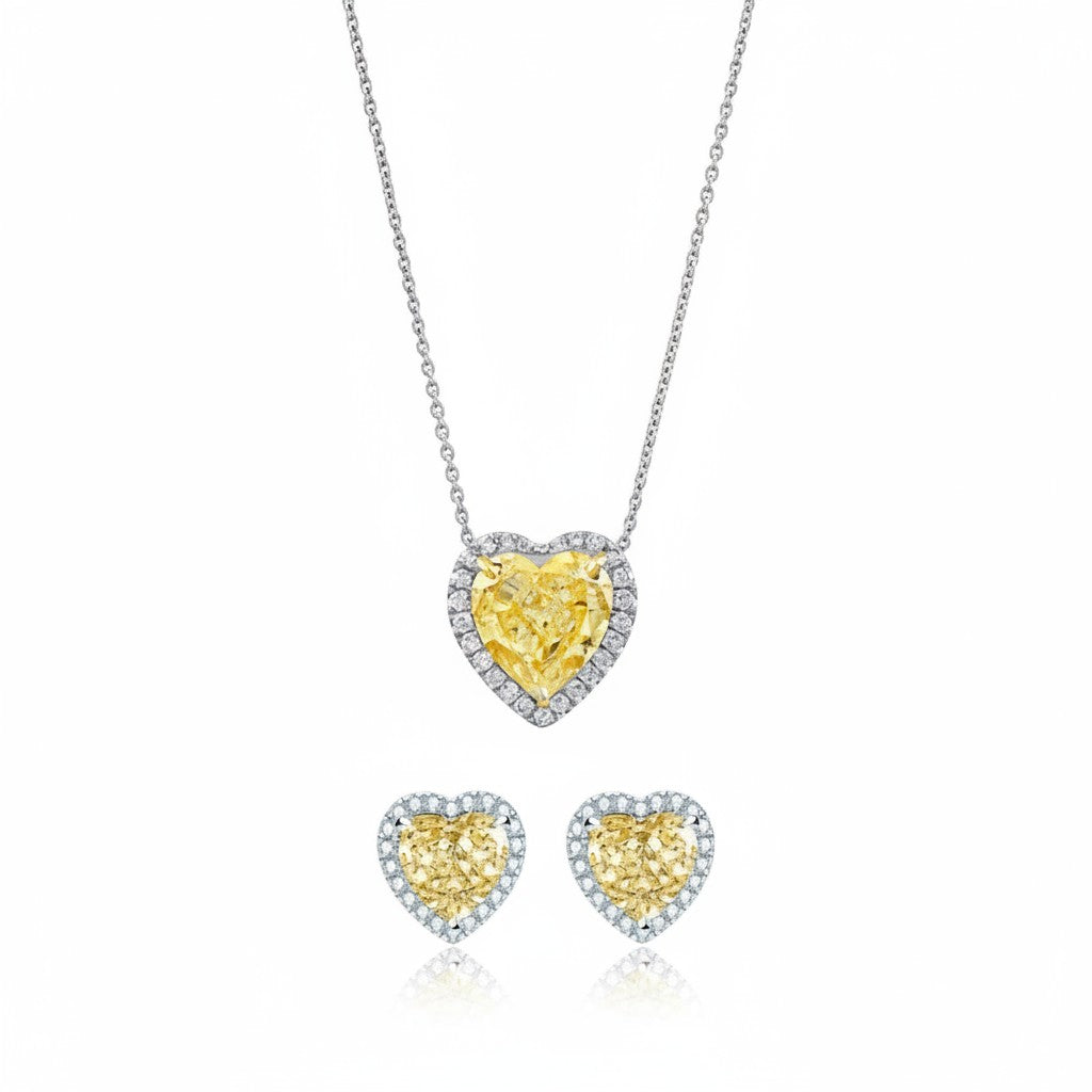 My Store 4 heart-cut yellow diamond halo necklace and matching stud earrings set in white gold.