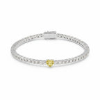 My Store 4 tennis bracelet featuring a central fancy yellow heart-cut diamond surrounded by round white diamonds.