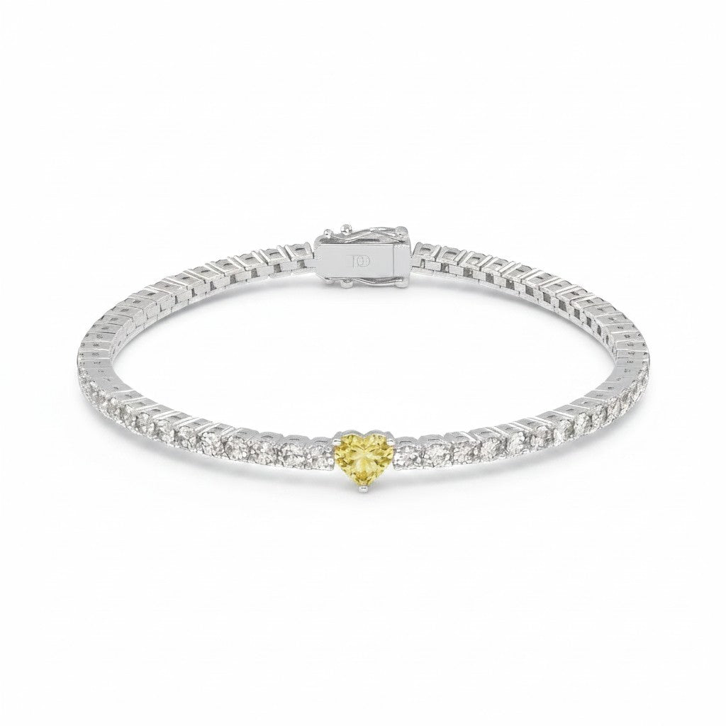 My Store 4 tennis bracelet featuring a central fancy yellow heart-cut diamond surrounded by round white diamonds.