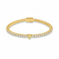 My Store 4 yellow gold tennis bracelet featuring a central heart-cut yellow diamond and round white diamond links.