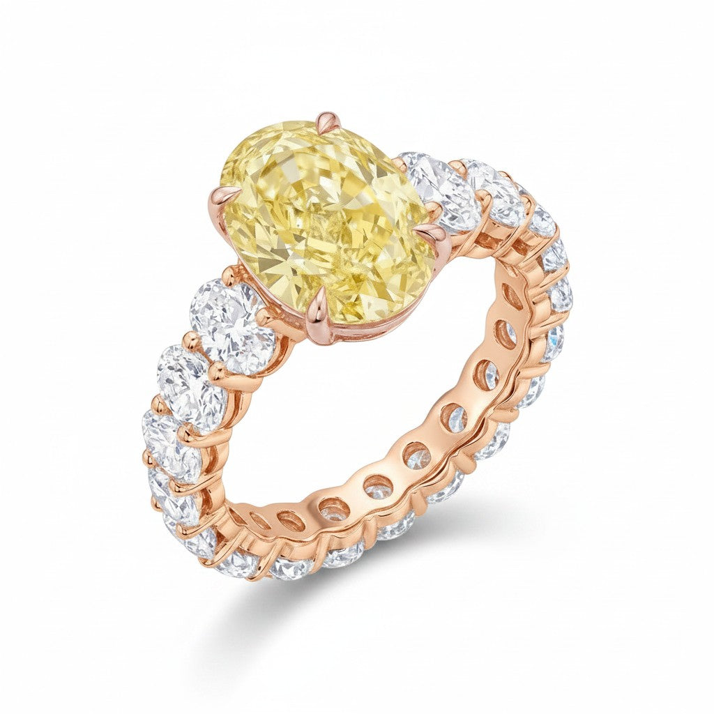 My Store 4 18K solid gold engagement ring featuring a fancy yellow oval lab-grown diamond on a diamond-encrusted band.