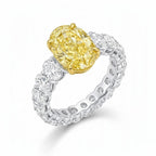My Store 4 18K solid gold ring featuring a fancy yellow oval lab-grown diamond on a white diamond eternity band.