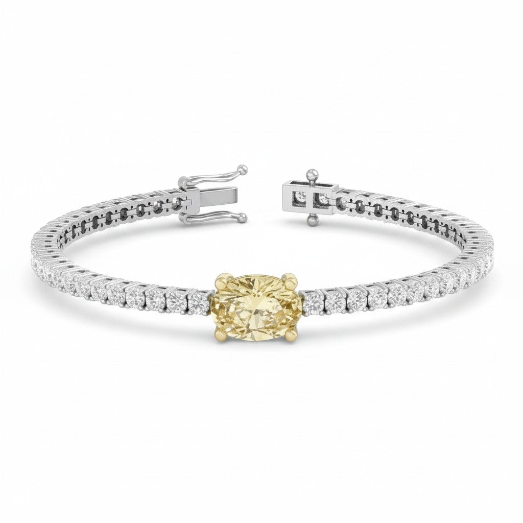 My Store 4 tennis bracelet featuring a central oval-cut fancy yellow diamond flanked by round white diamonds in gold.