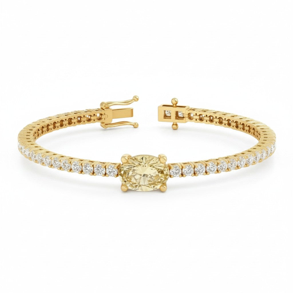 My Store 4 yellow gold tennis bracelet featuring a central oval-cut fancy yellow diamond and round white diamonds.