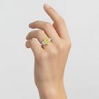 My Store 4 18K solid gold trilogy ring featuring a fancy yellow oval lab-grown diamond on a woman's hand