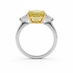 My Store 4 18K gold trilogy ring featuring a fancy yellow oval lab-grown diamond with side stones on a white background