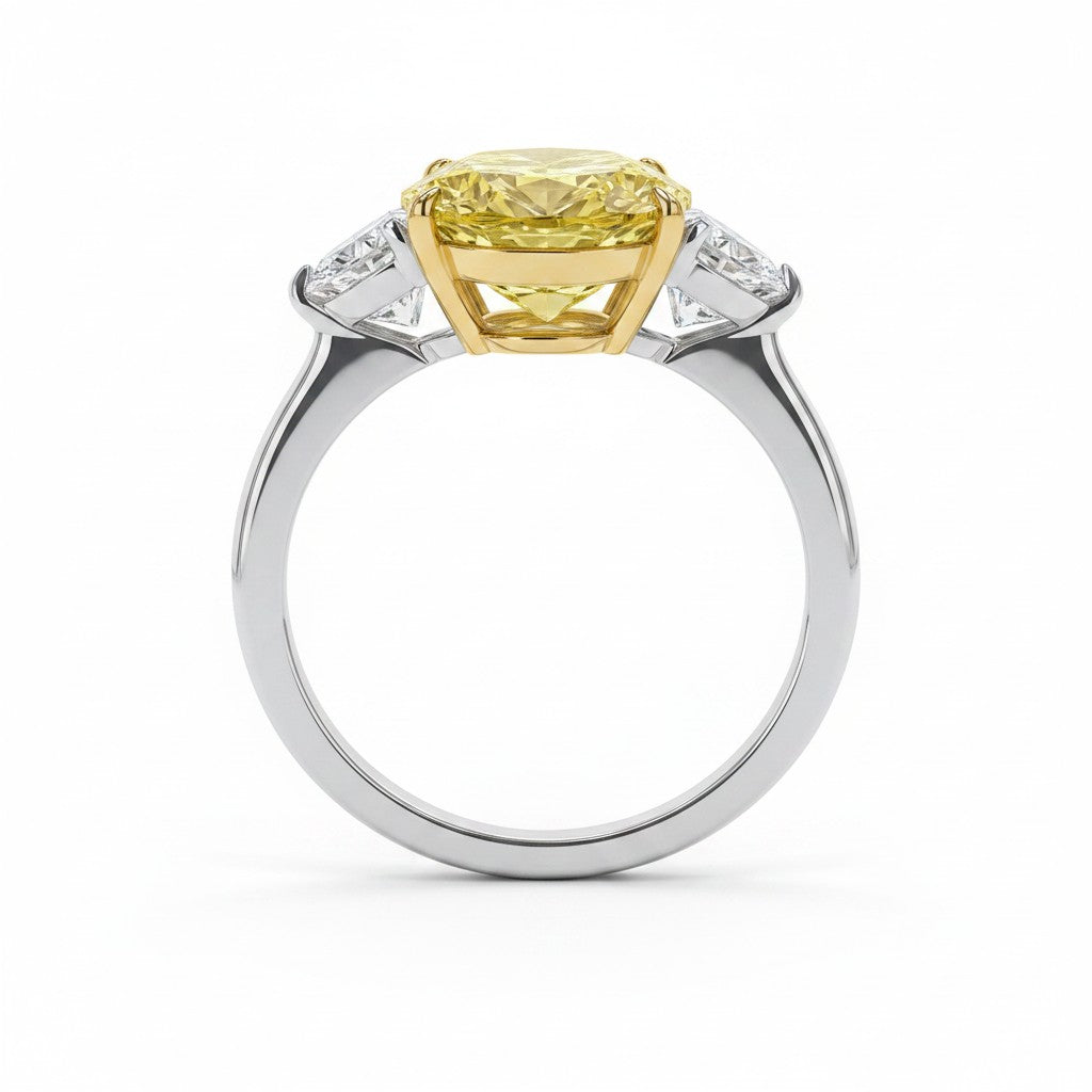 My Store 4 18K gold trilogy ring featuring a fancy yellow oval lab-grown diamond with side stones on a white background