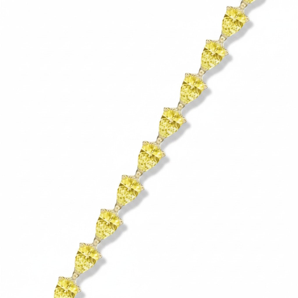 My Store 4 luxury tennis bracelet featuring a continuous row of fancy yellow pear-cut diamonds in gold 3-prong settings