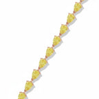 My Store 4 fancy yellow pear-cut diamond tennis bracelet in a gold 3-prong setting on a white background.