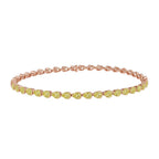 My Store 4 tennis bracelet featuring fancy yellow pear-cut diamonds in a rose gold half-bezel setting.