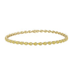 My Store 4 tennis bracelet featuring fancy yellow pear-cut diamonds in a solid yellow gold half-bezel setting.