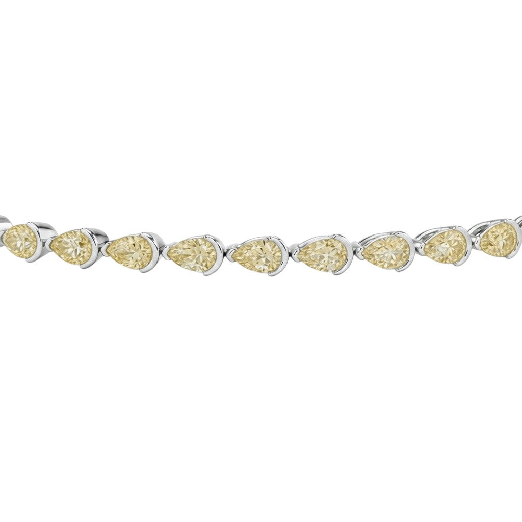 My Store 4 tennis bracelet featuring fancy yellow pear-cut diamonds in sleek white gold half-bezel settings.
