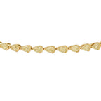 My Store 4 tennis bracelet featuring fancy yellow pear-cut diamonds in solid gold half-bezel settings.