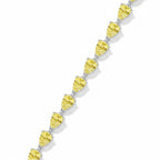 My Store 4 fancy yellow pear-cut diamond tennis bracelet in a continuous tip-to-end gold setting.