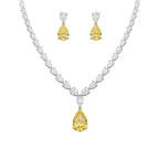 My Store 4 bridal jewelry set featuring a white pear-cut diamond necklace with a fancy yellow pear-shaped drop pendant.