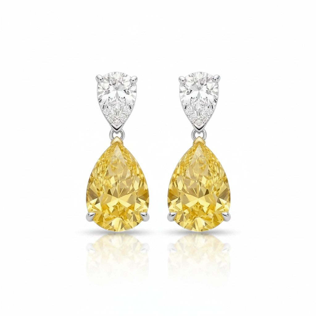 My Store 4 bridal drop earrings featuring white pear-cut diamond tops and fancy yellow pear-shaped diamond drops.