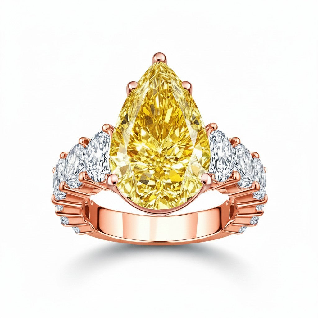 My Store 4 18K solid gold ring featuring a fancy yellow pear-cut lab diamond with side accent stones