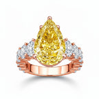 My Store 4 18K solid gold ring featuring a fancy yellow pear-cut lab diamond with side accent stones