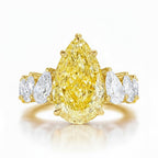 My Store 4 18K solid gold engagement ring featuring a fancy yellow pear-cut lab diamond with side accent stones.