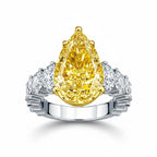 My Store 4 18K solid gold engagement ring featuring a fancy yellow pear-cut lab diamond with side accent stones