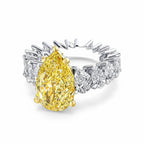 My Store 4 18K gold ring featuring a pear-cut fancy yellow lab diamond surrounded by pear-cut white diamond accents.