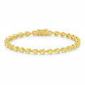 My Store 4 yellow gold tennis bracelet featuring a continuous row of pear-cut fancy yellow diamonds in 3-prong settings