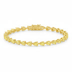 My Store 4 yellow gold tennis bracelet featuring a continuous row of pear-cut fancy yellow diamonds in 3-prong settings