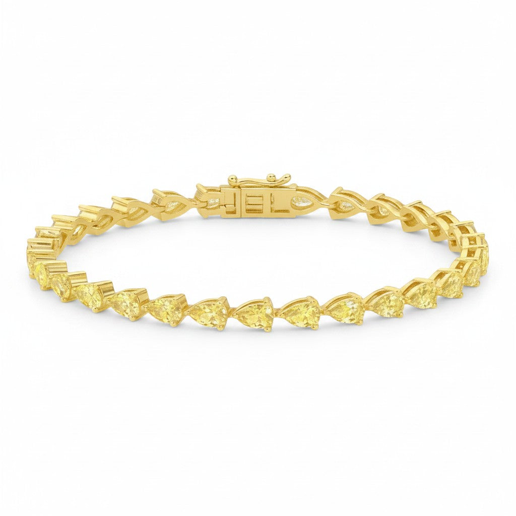 My Store 4 yellow gold tennis bracelet featuring a continuous row of pear-cut fancy yellow diamonds in 3-prong settings