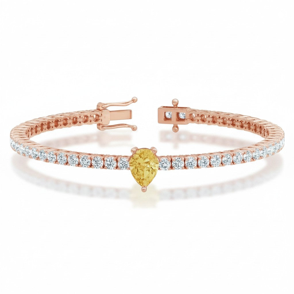 My Store 4 rose gold tennis bracelet featuring a central fancy yellow pear-cut diamond and round white diamonds.