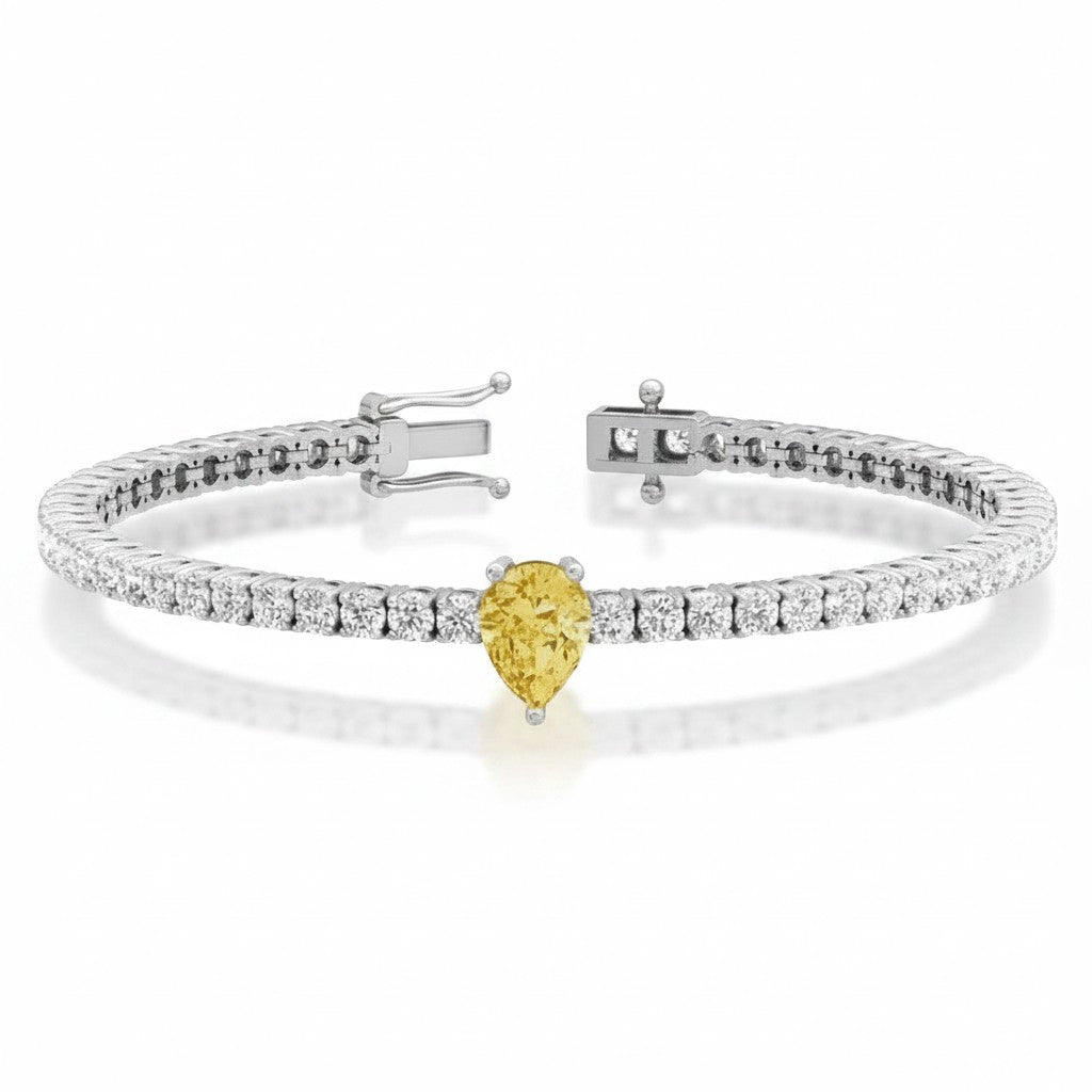 My Store 4 tennis bracelet featuring a central fancy yellow pear-cut diamond surrounded by round white diamonds in gold.