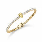 My Store 4 tennis bracelet featuring a central fancy yellow pear-cut diamond surrounded by round white diamonds in gold.