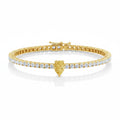 My Store 4 tennis bracelet featuring a central fancy yellow pear-cut diamond surrounded by round white diamonds in gold.