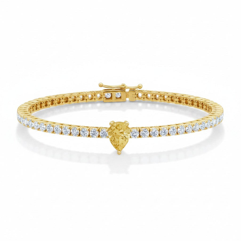 My Store 4 tennis bracelet featuring a central fancy yellow pear-cut diamond surrounded by round white diamonds in gold.