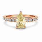 My Store 4 18K solid gold ring featuring a fancy yellow pear-cut diamond with pavé-set diamond accents