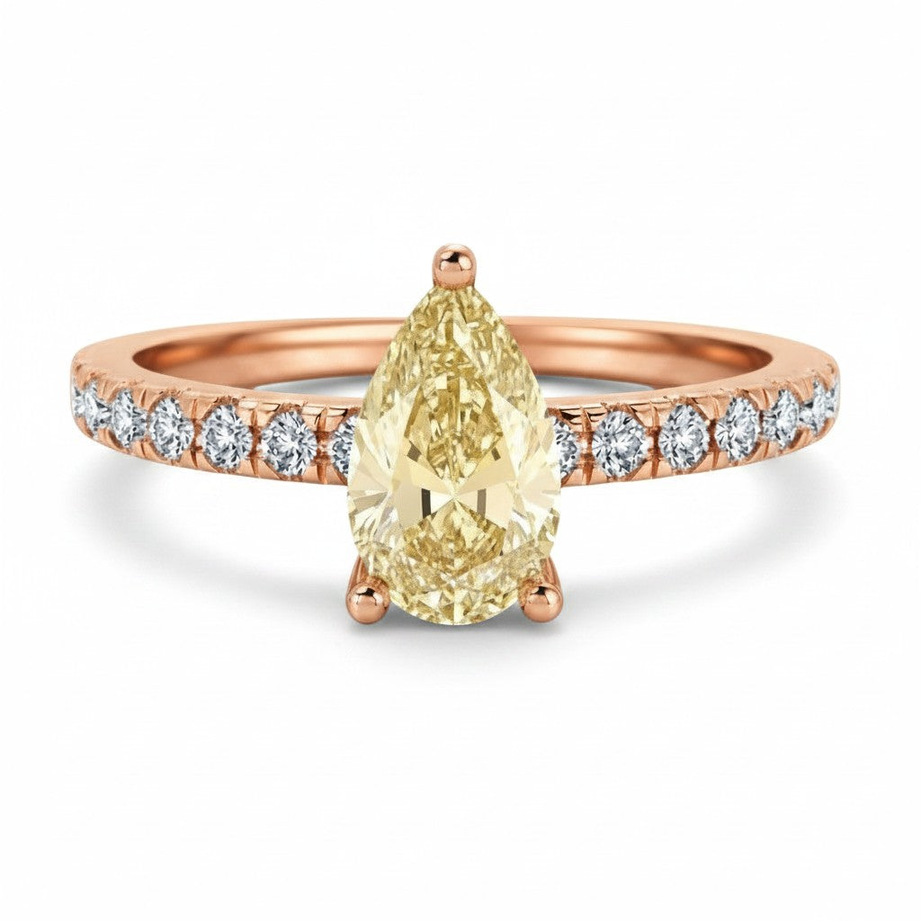 My Store 4 18K solid gold ring featuring a fancy yellow pear-cut diamond with pavé-set diamond accents