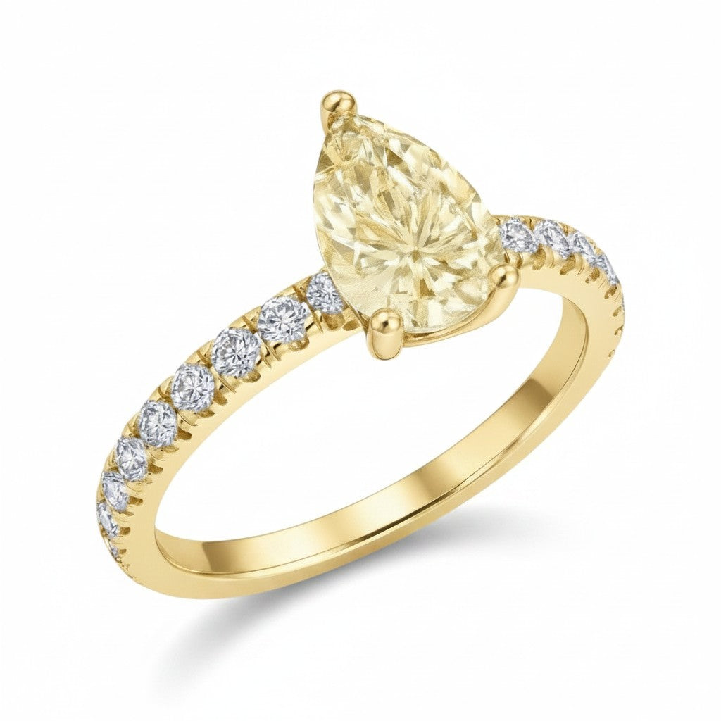 My Store 4 18K solid yellow gold ring featuring a pear-cut fancy yellow diamond with pavé-set white diamonds.