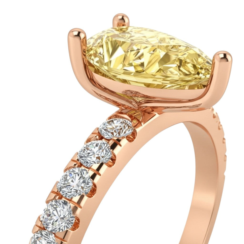 My Store 4 18K solid gold ring featuring a fancy yellow pear-cut diamond with pavé-set white diamonds on the band.