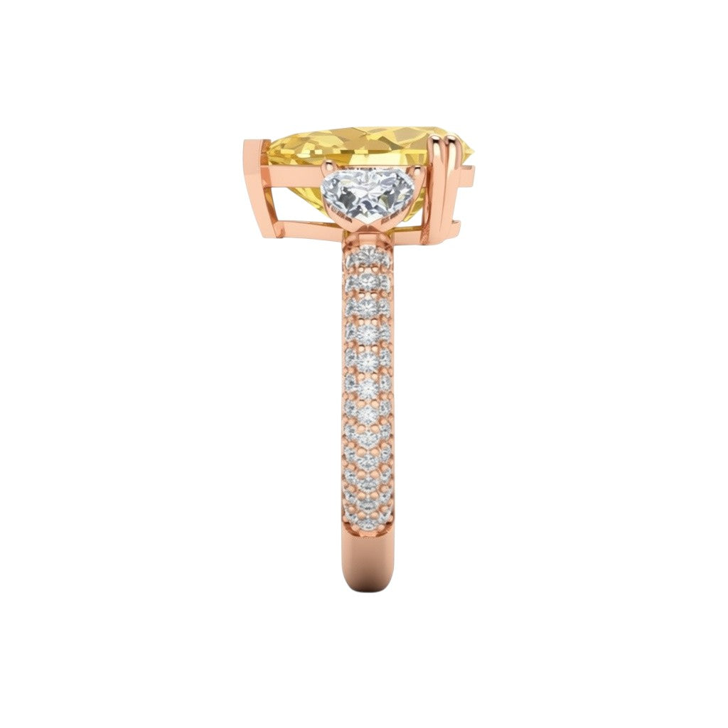 My Store 4 18K solid gold trilogy ring featuring a fancy yellow pear-cut lab diamond and diamond-encrusted band