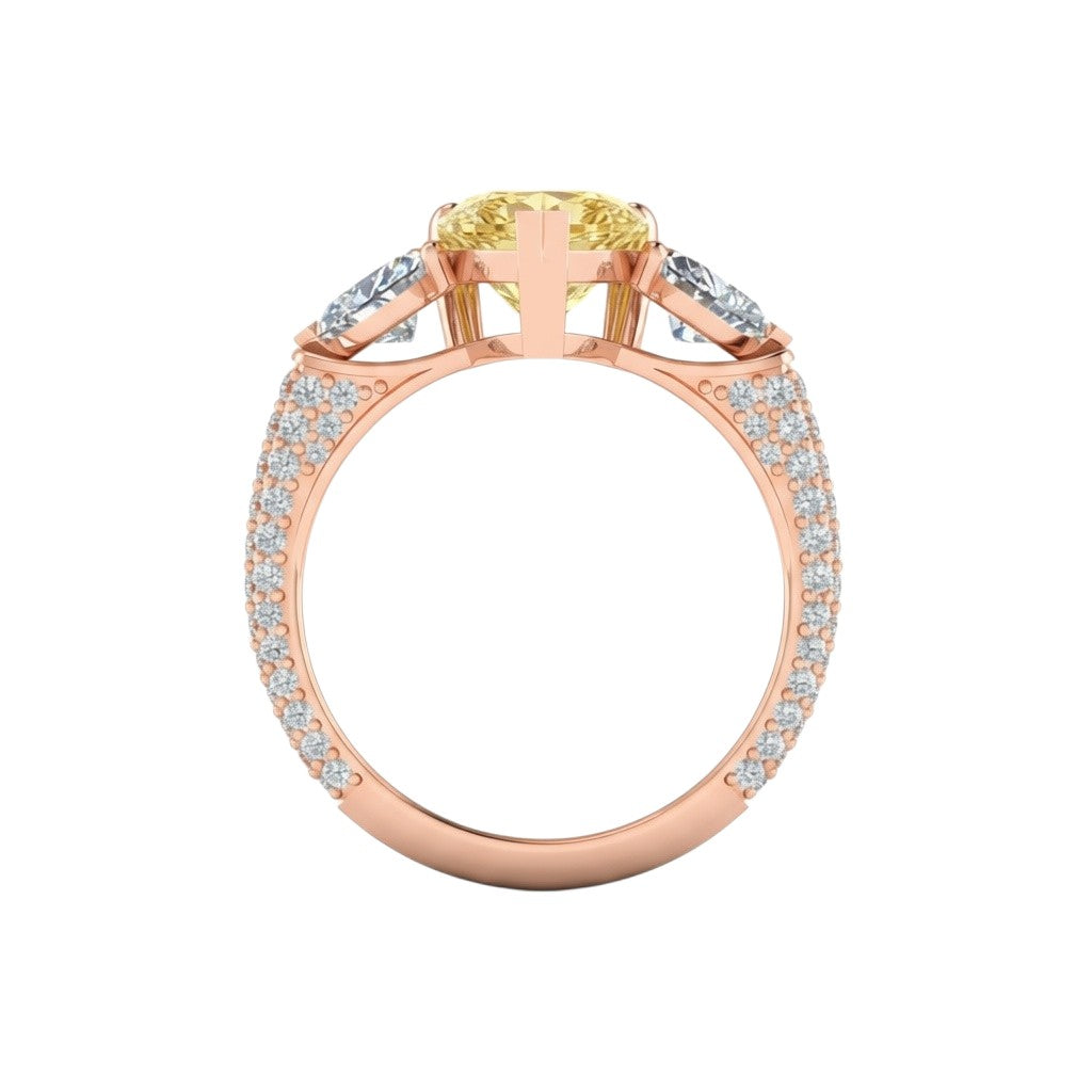 My Store 4 18K rose gold trilogy ring featuring a fancy yellow pear-cut lab diamond and pavé diamond band
