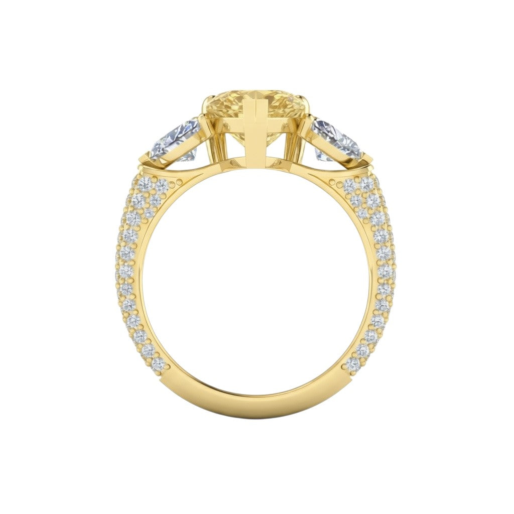 My Store 4 18K solid gold trilogy ring featuring a fancy yellow pear-cut lab diamond with pavé diamond band