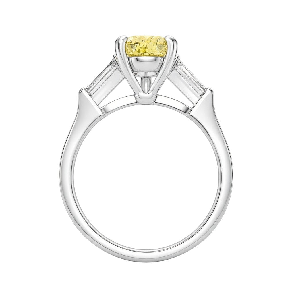 My Store 4 18K gold trilogy ring featuring a pear-cut yellow diamond centerpiece and baguette side diamonds.