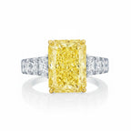 My Store 4 18K gold ring featuring a radiant-cut fancy yellow lab-grown diamond with side stones on a white background