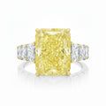 My Store 4 18K solid gold engagement ring featuring a radiant-cut fancy yellow lab-grown diamond with side stones.