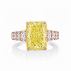 My Store 4 18K solid gold engagement ring featuring a radiant-cut fancy yellow lab-grown diamond with side stones.